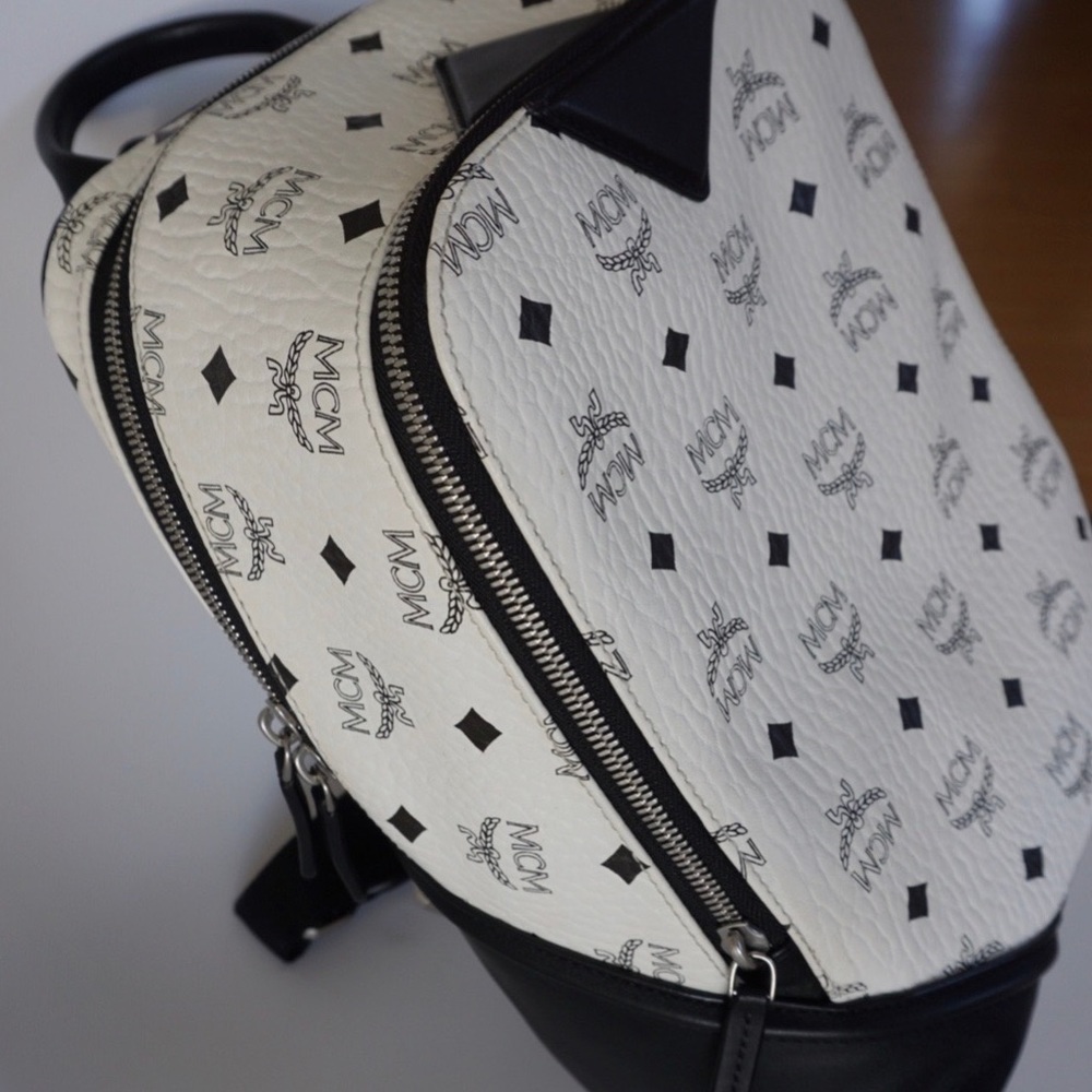 White and black mcm backpack